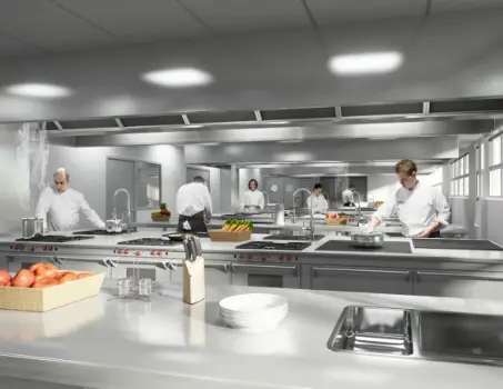 Imagen de una cocina moderna de restaurante con cocineros trabajando